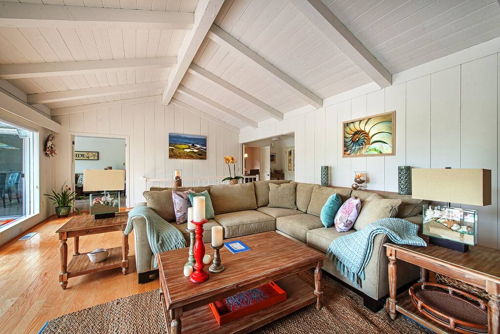 The comfy sectional sofa is perfect for gathering or curling up in front of the fire.