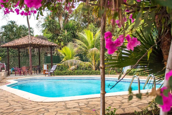 poolside room in colonial mansion