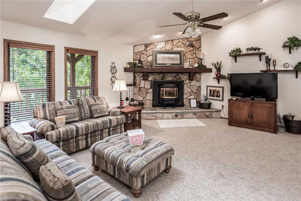 After the sun sets, kick back and relax. Amy's Little Ponderosa's comfortable living furniture has plenty of room for everyone.