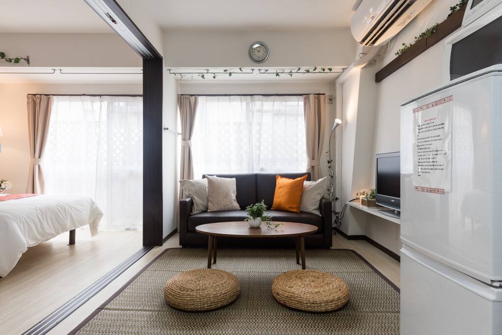 Sofa and tatami carpet. Japanese modern interior.