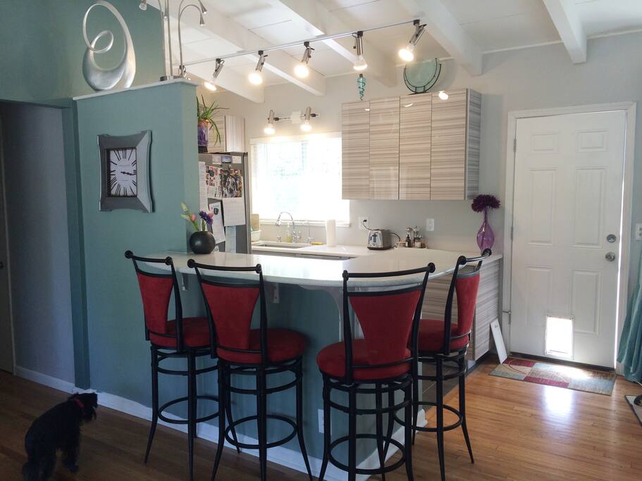 the kitchen bar seats 4 comfortably