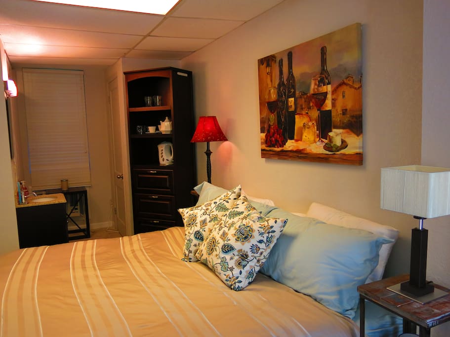 King bed, small TV, Cable channels.