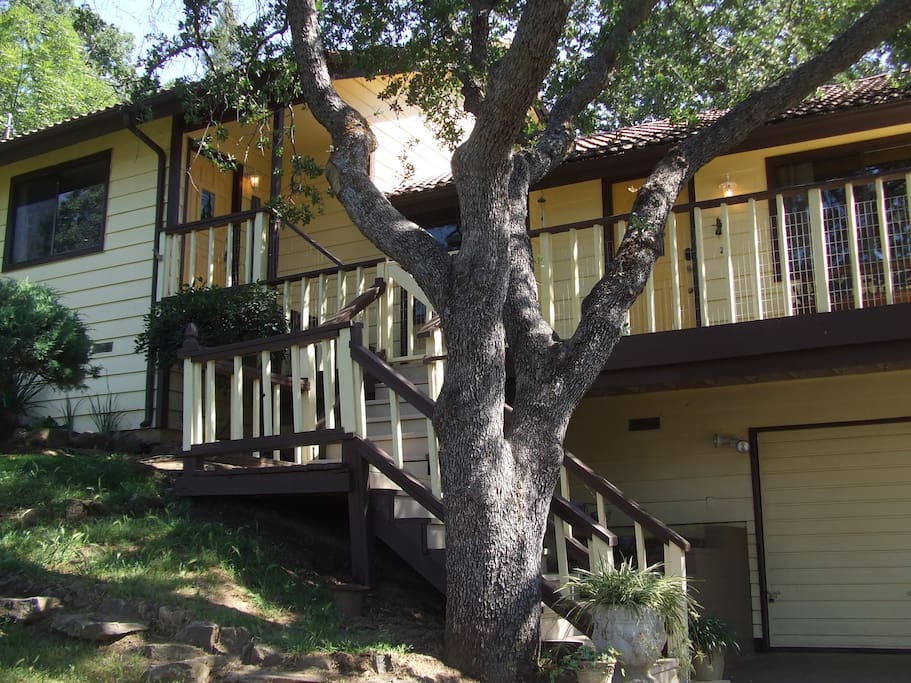 Oak covered elevated wrap around balcony