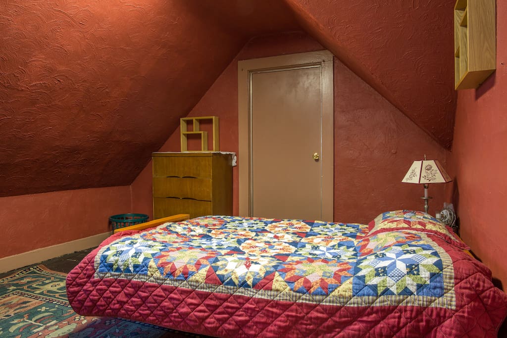Accessed via the playroom, and lockable for pricacy, this is the double bed and the other of the two dressers for guests in the large upstairs bedroom