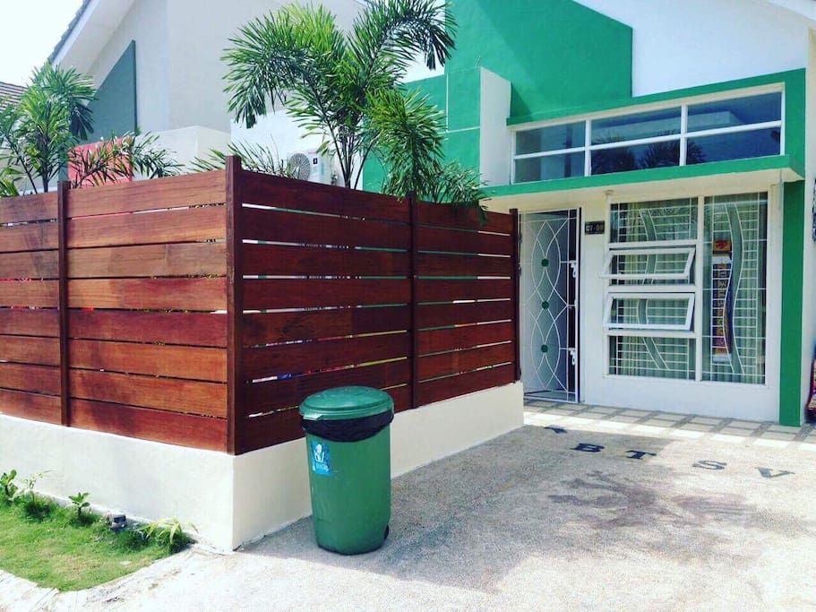 Privat parking area in front of the house.. garden cover with nice wooden fences