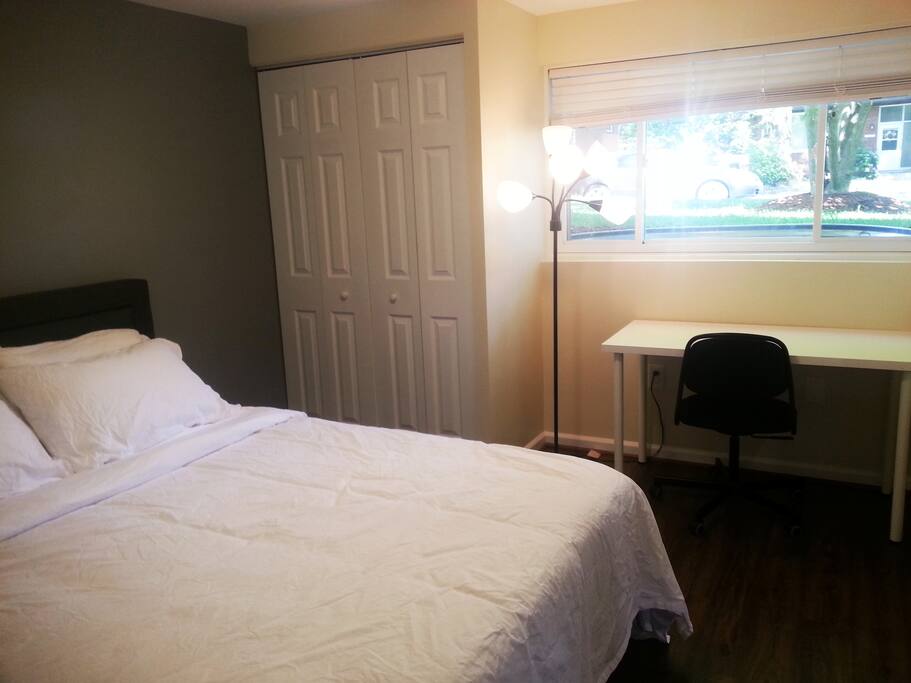 Bed Room with an office desk and chair