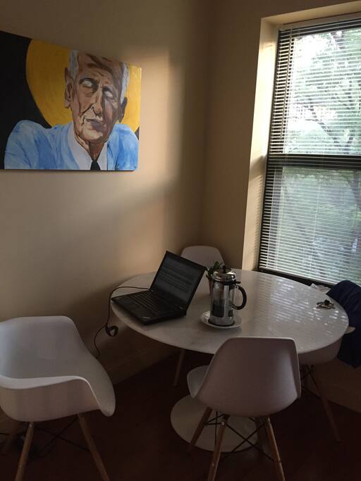 Catch up on some emails while you sip on a french press and sit at the mid-century marble kitchen nook
