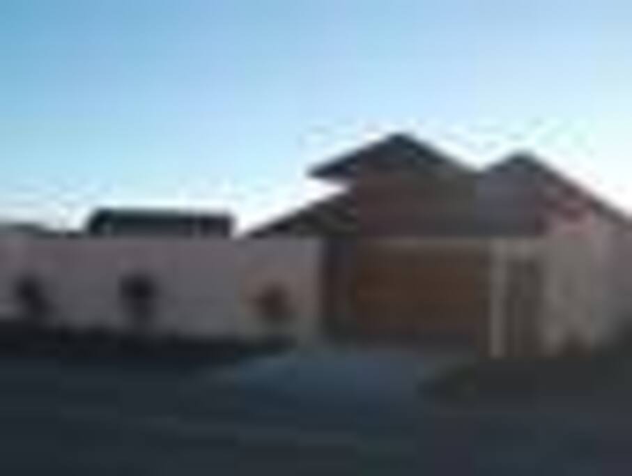 Modern house, with lots of out door dining areas.