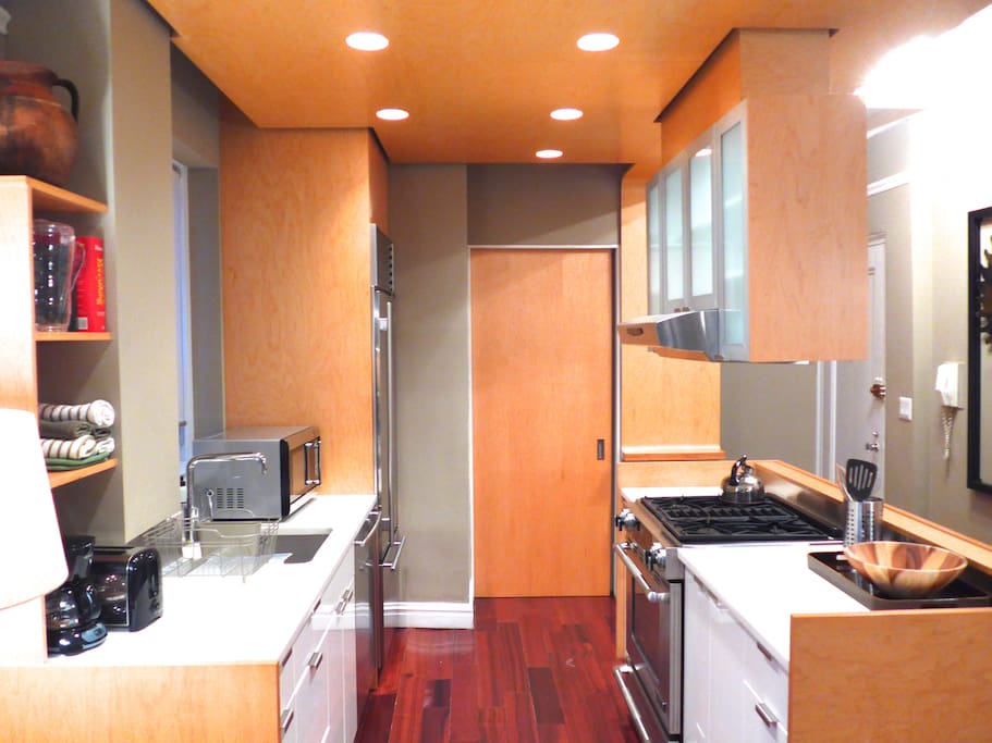 Gourmet kitchen with Subzero and jennair stainless steel appliances