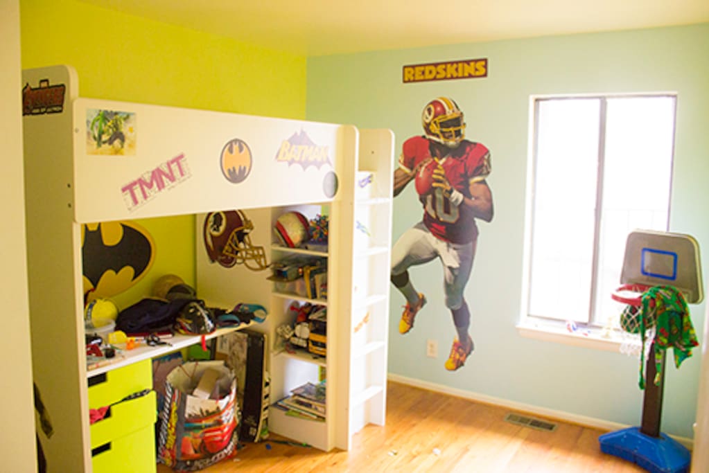 Kids room with single bunk and extra air mattress