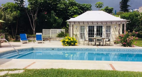 Pool house in a garden setting (+ EV chargers)