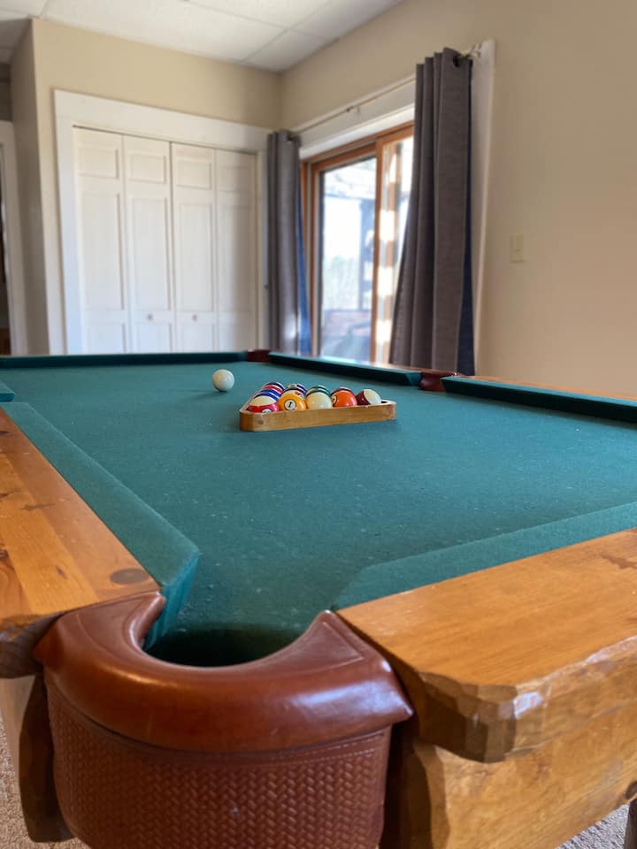 Pool table on the basement/walk out level.