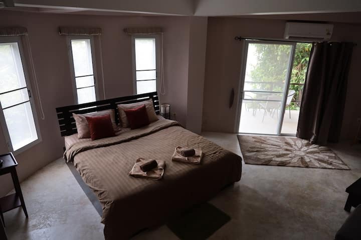 Lower floor master bedroom with aircon, balcony and ensuite 