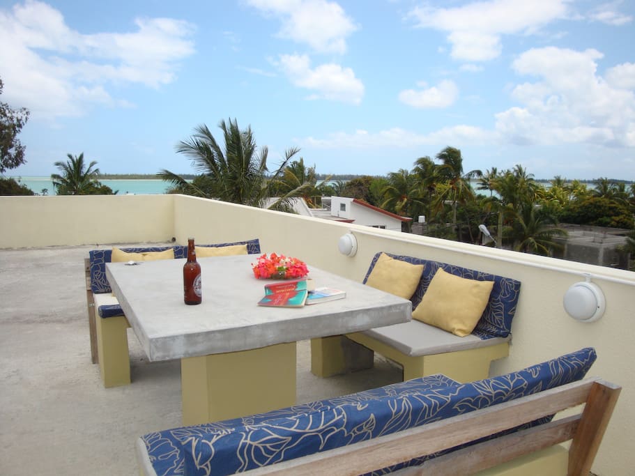 Watch the sun go down over the lagoon while you BBQ from our amazing shared roof terrace