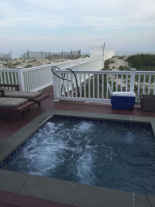 Jacuzzi and walkway to beach and ocean.