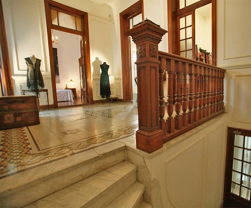 Marble staircase leading up to the hallway