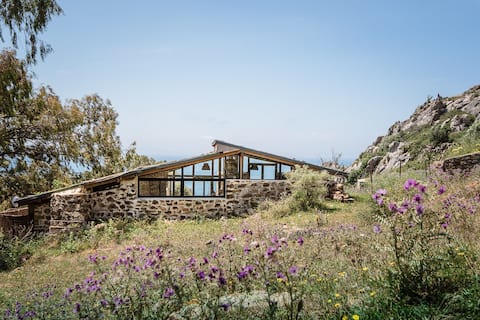 Charming mountain hideaway with  sea views.