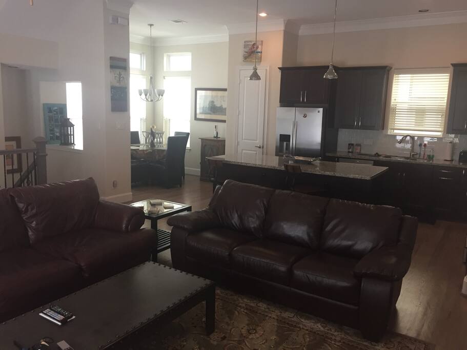 Open area living, dining and kitchen area.