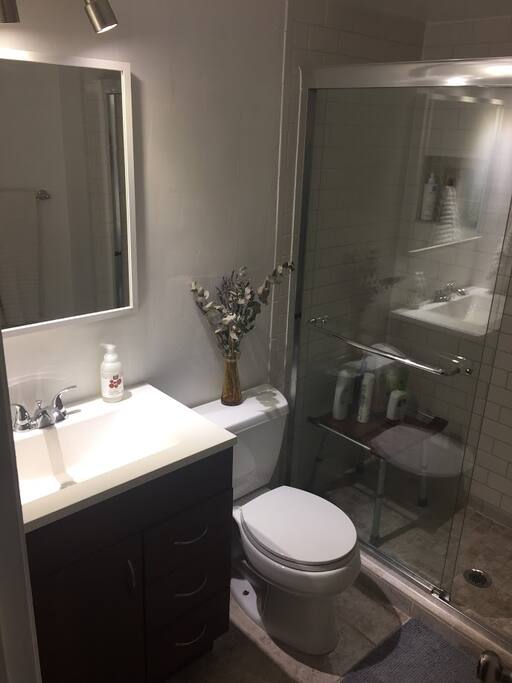 Bathroom - Tall shower, updated subway tiles, plenty of storage