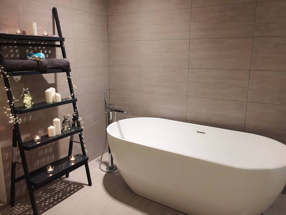 Romantic bathtub at night, perfect for couples