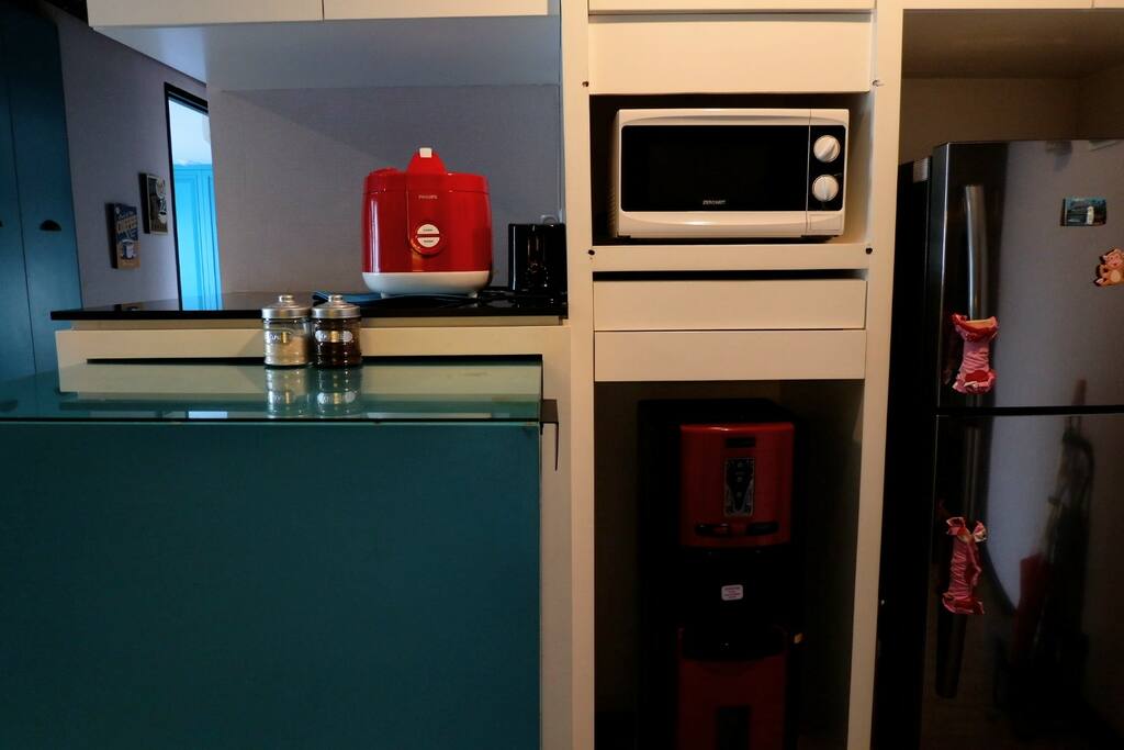 Amenities (rice cooker, microwave, bread toaster, water dispenser, fridge)