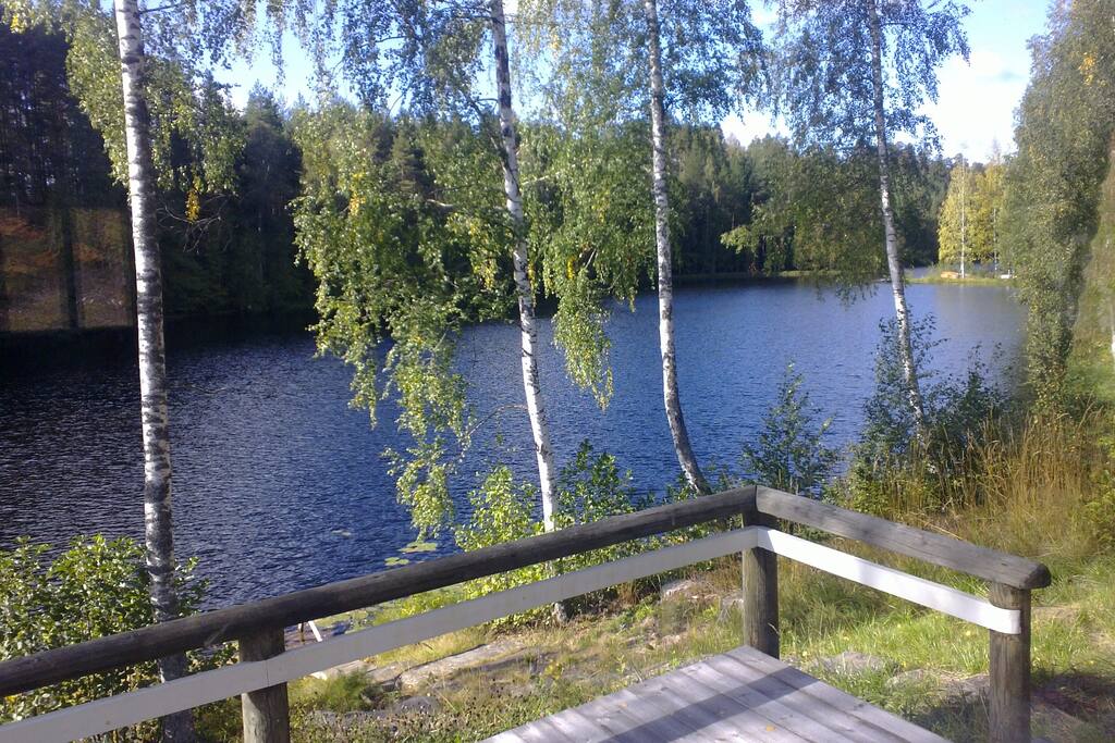 The terass has afternoon sun, the sun sets towards the end of the lake