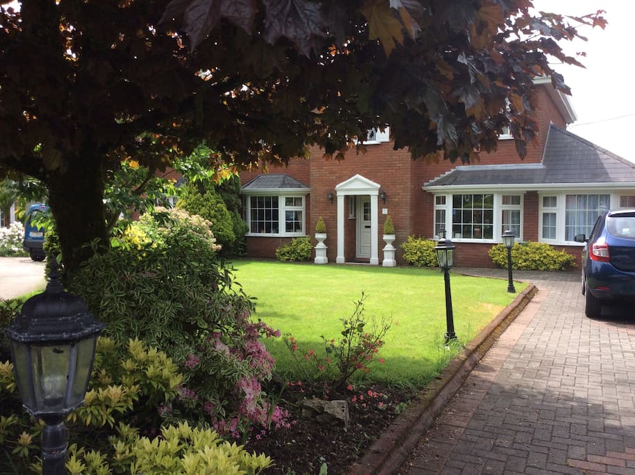 Front of house with apartment on the right.
