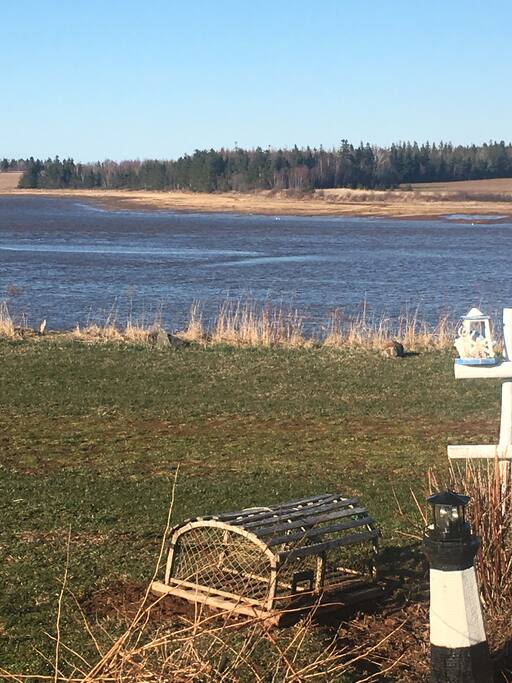 Nice view from deck looking up the river while relaxing with an outdoor evening meal with the barbecue and utensils provided!!
