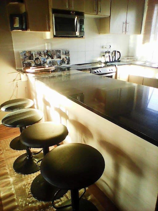 Breakfast bar in open plan downstairs