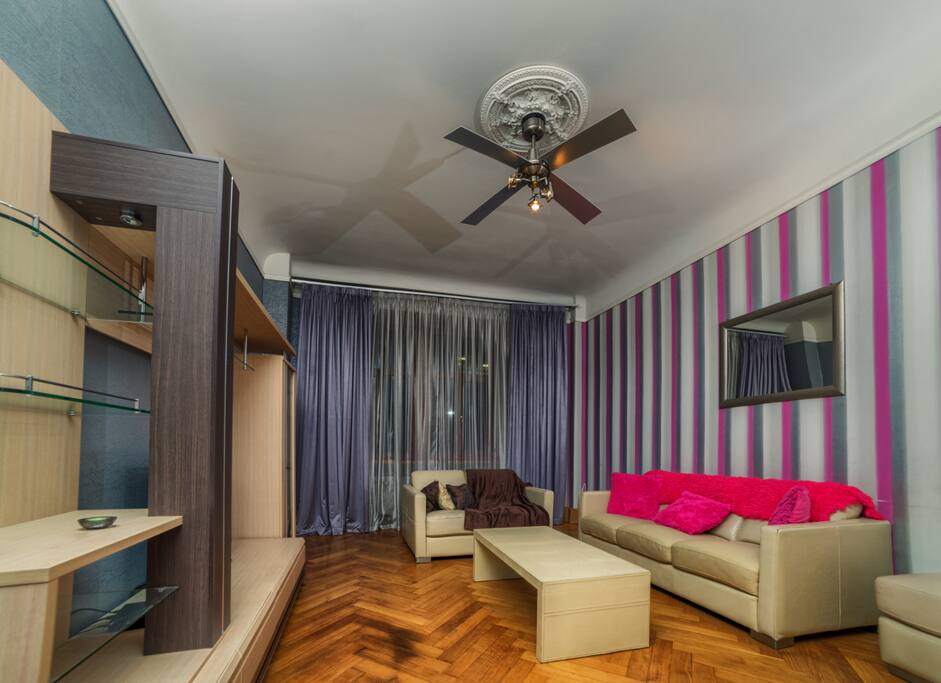 Living room with cable tv.