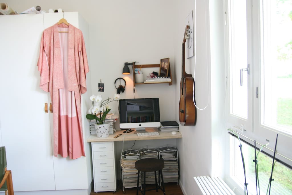 Bedroom 1 with computer and small workspace