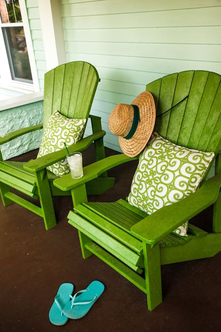 Enjoy the view from the front porch from these comfy Adirondack chairs