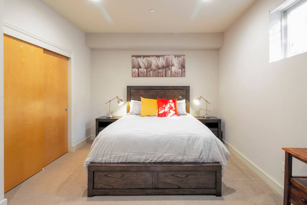 Oversized bedroom with morning light.