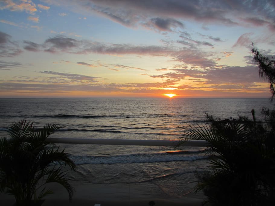 Directly on the Beach - enjoy the sound of the ocean and the breeze from your private balcony.