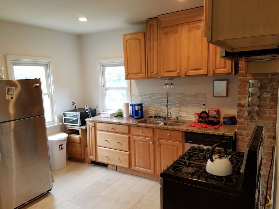 Our kitchen with all stainless steel appliances, wine chiller and decanter, coffee and breakfast station with waffle maker