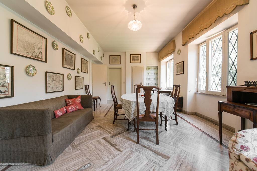 A well furnished living dining room .This was where, when we lived in Rome we spent our time.