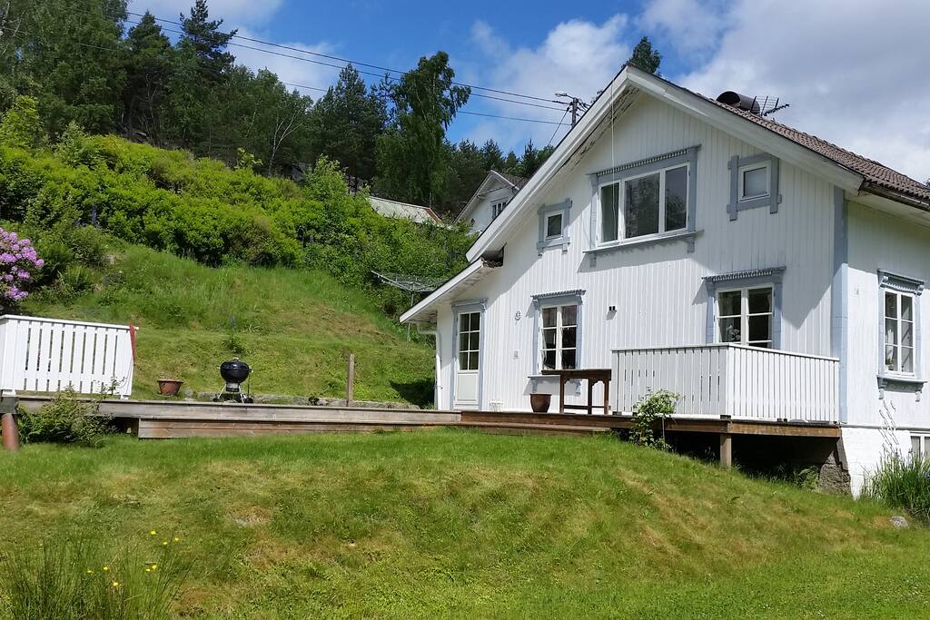 House seen from stream
