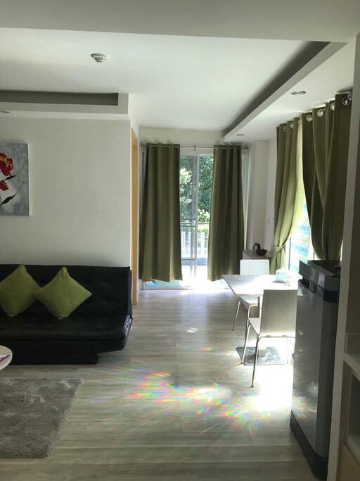 Living room with dining area, with access to the terrace