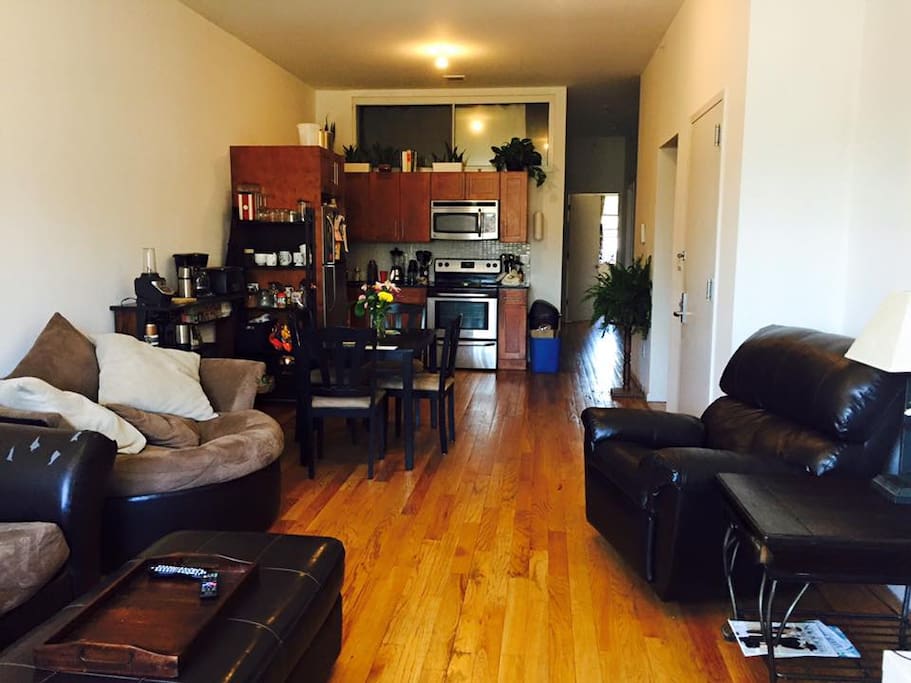 Super spacious living space. All you need to make your home meals. The couch is super comfortable. You will want to spend a lot of hours reading while taking in the sunlight.