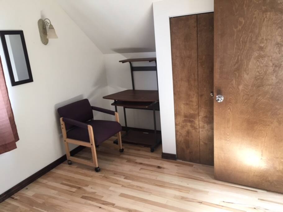 Another angle of bedroom showing closet