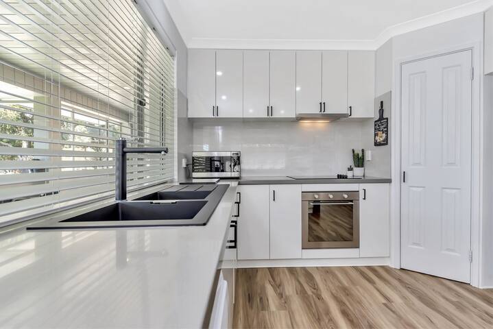 Absolute riverfront modern home, private jetty. gallery image 5