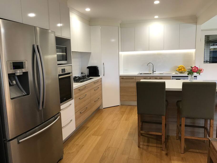 Modern appliances and gas cooktop.