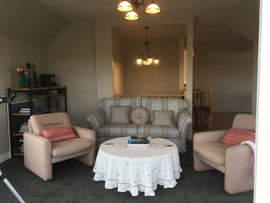 Upstairs lounge room with balcony
