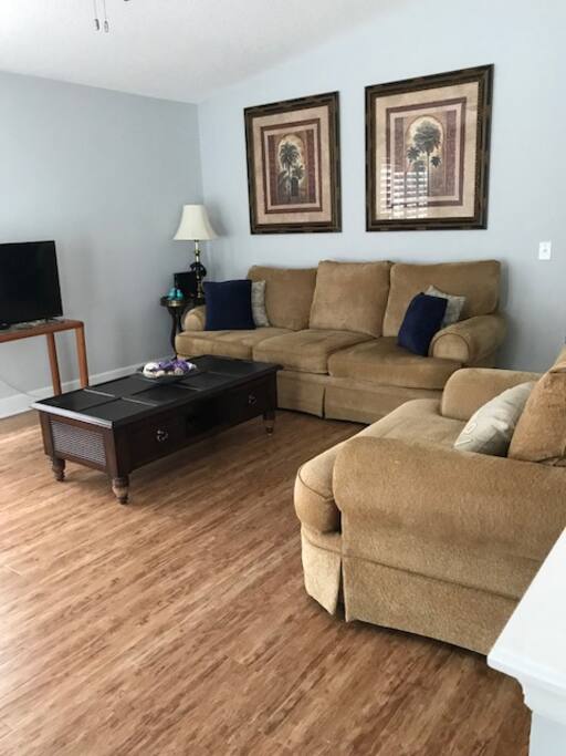 Upstairs Family room opens to the ocean breezes