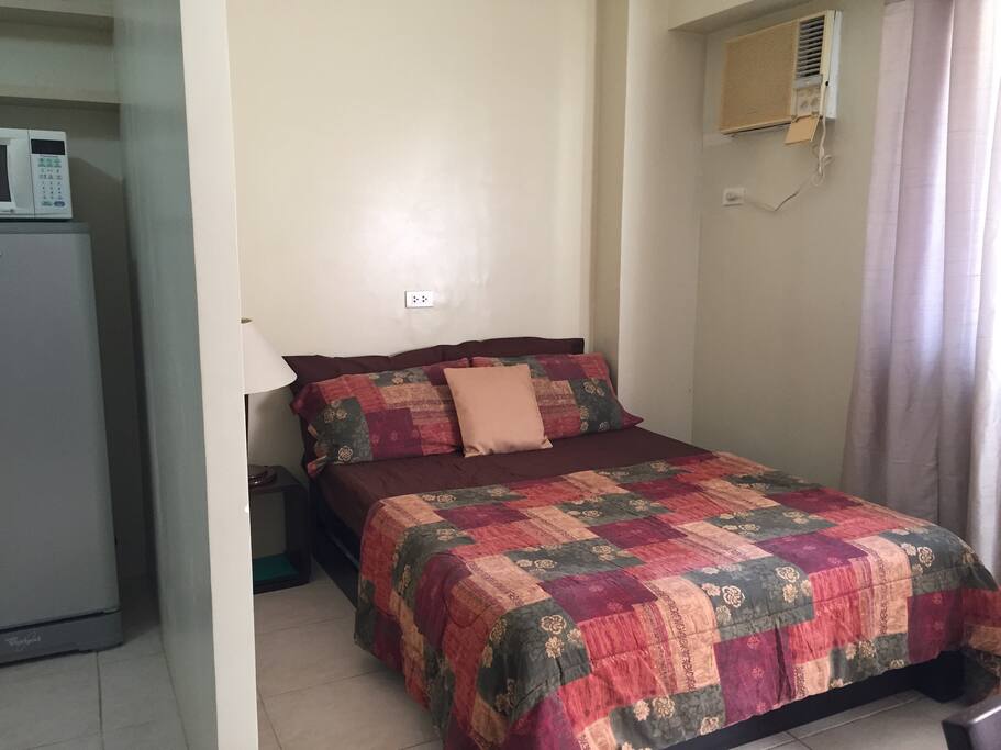 full/standard bed w/ pull-out (twin-sized) bed; 1.5 HP aircon