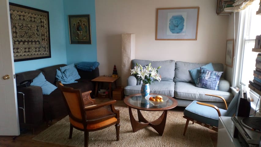 Bright top floor flat looking out sea