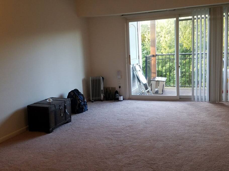 Open space for practicing yoga or morning calisthenics. Portable speaker, heater.