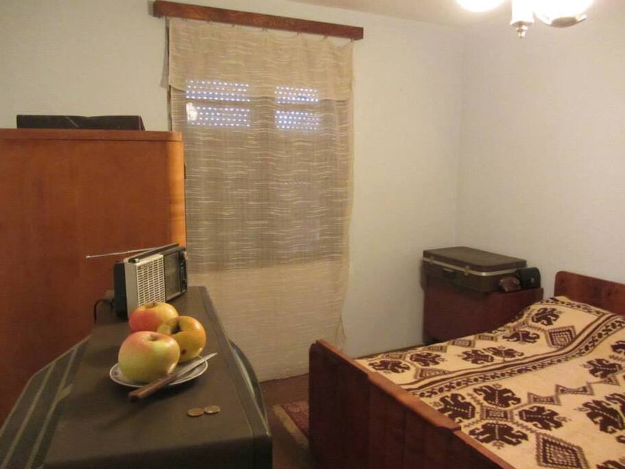 Room 1- frozen in the 70s all with the TV with home antenna, radio, suitcase, village night lamp and camera...