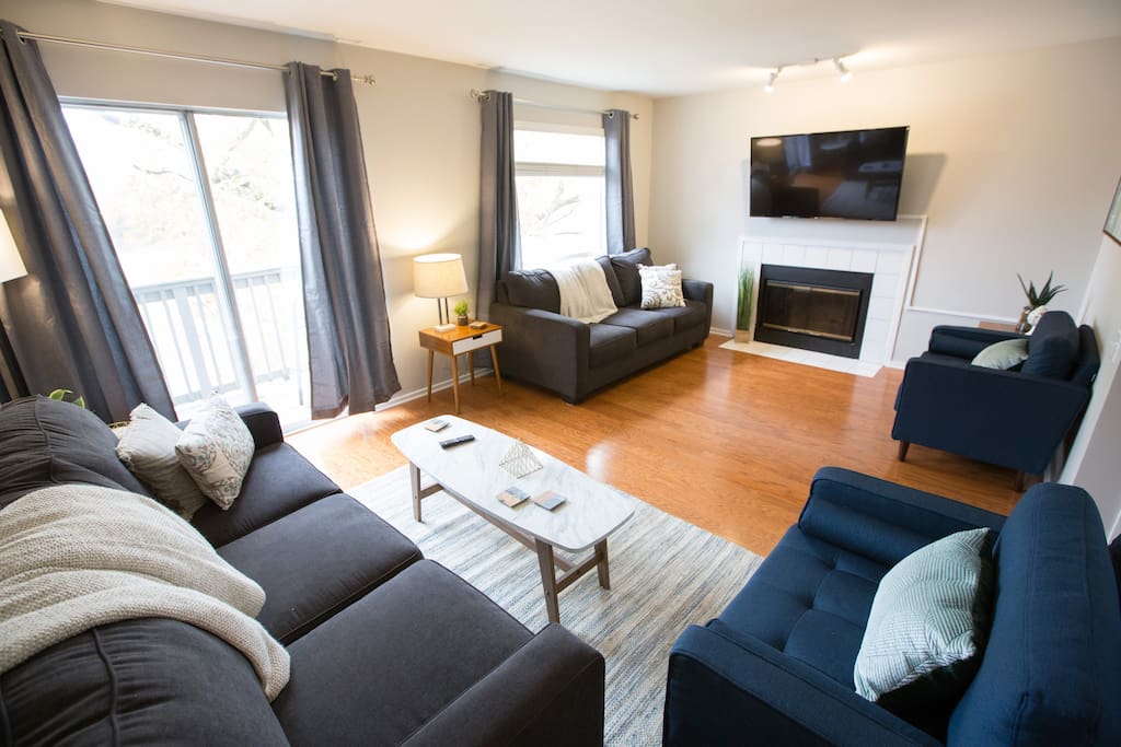 You'll feel comfy, cozy, and refreshed in our stylish living room. A great place to crash after being out on the town! Enjoy our 55" Smart TV. You can also relax on the balcony that overlooks the river!