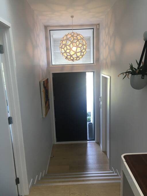 Entrance. Step up the lounge area, then a further couple of steps to main kitchen, living area (bedroom down hall all on one level)